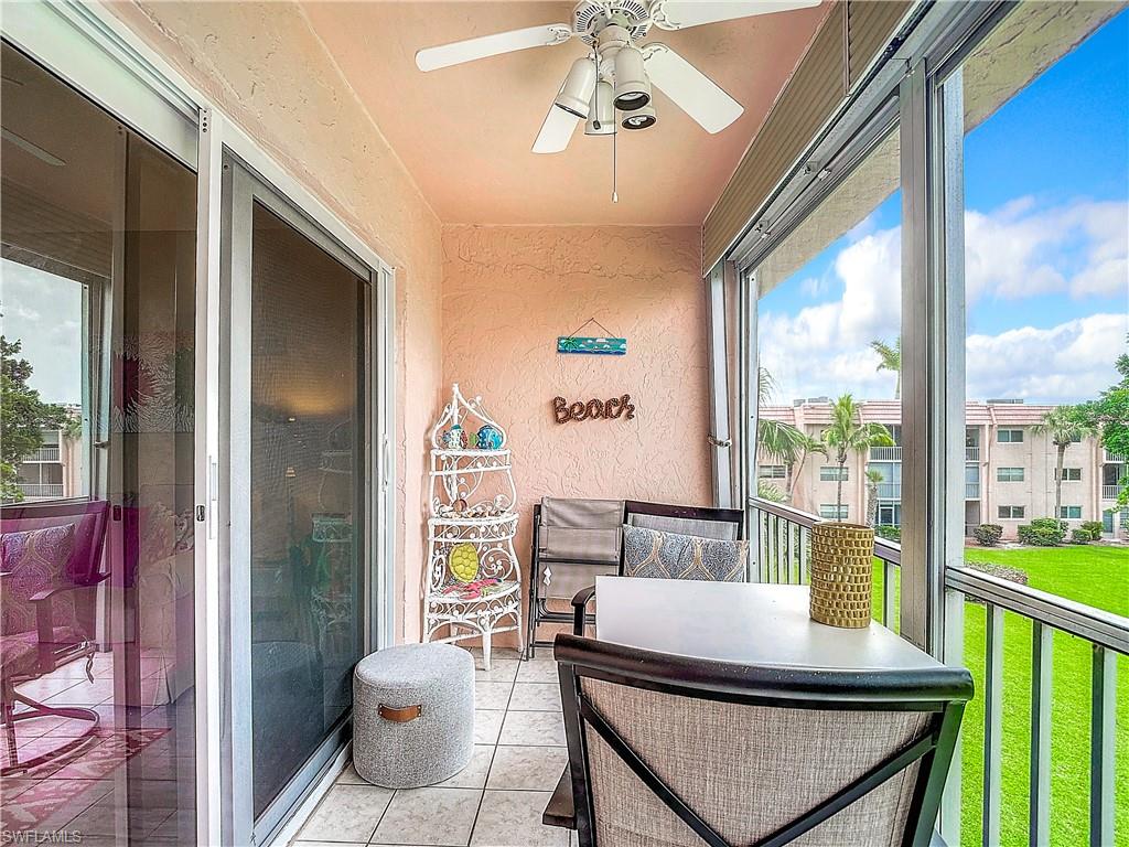 Sunroom featuring ceiling fan