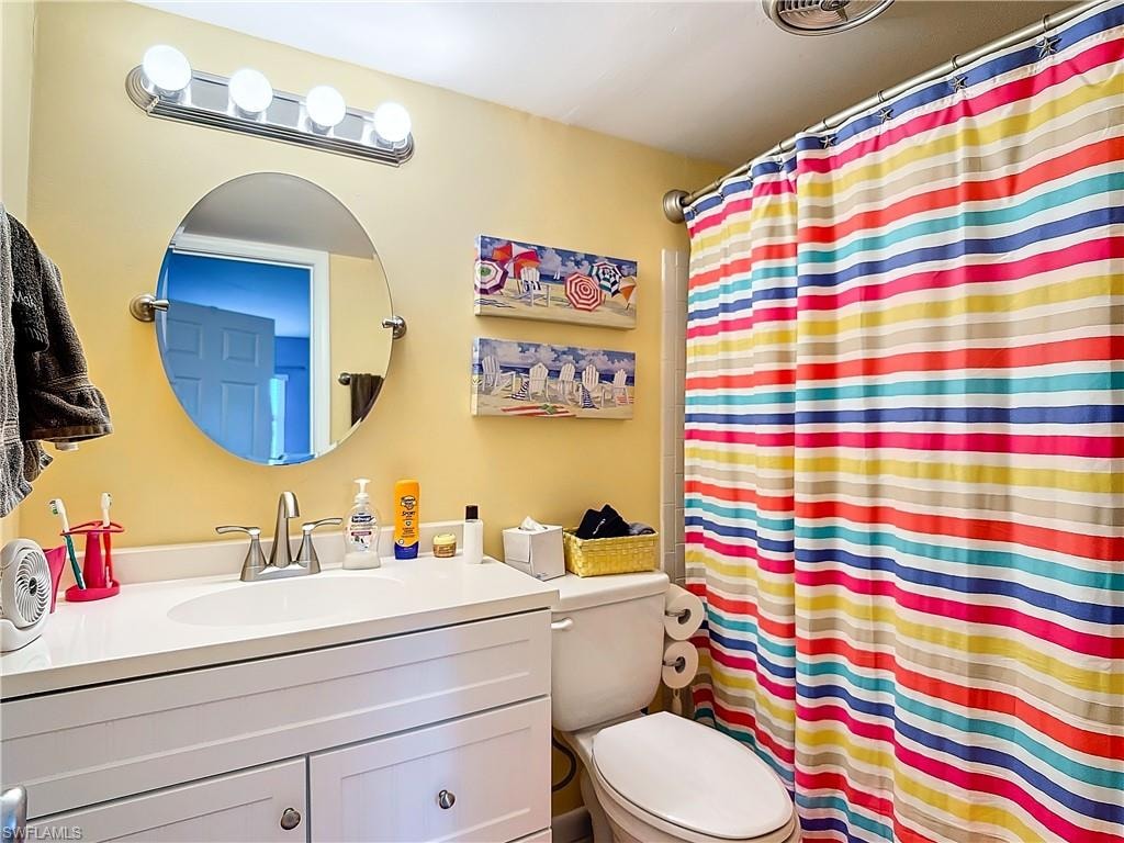 Bathroom featuring toilet and vanity