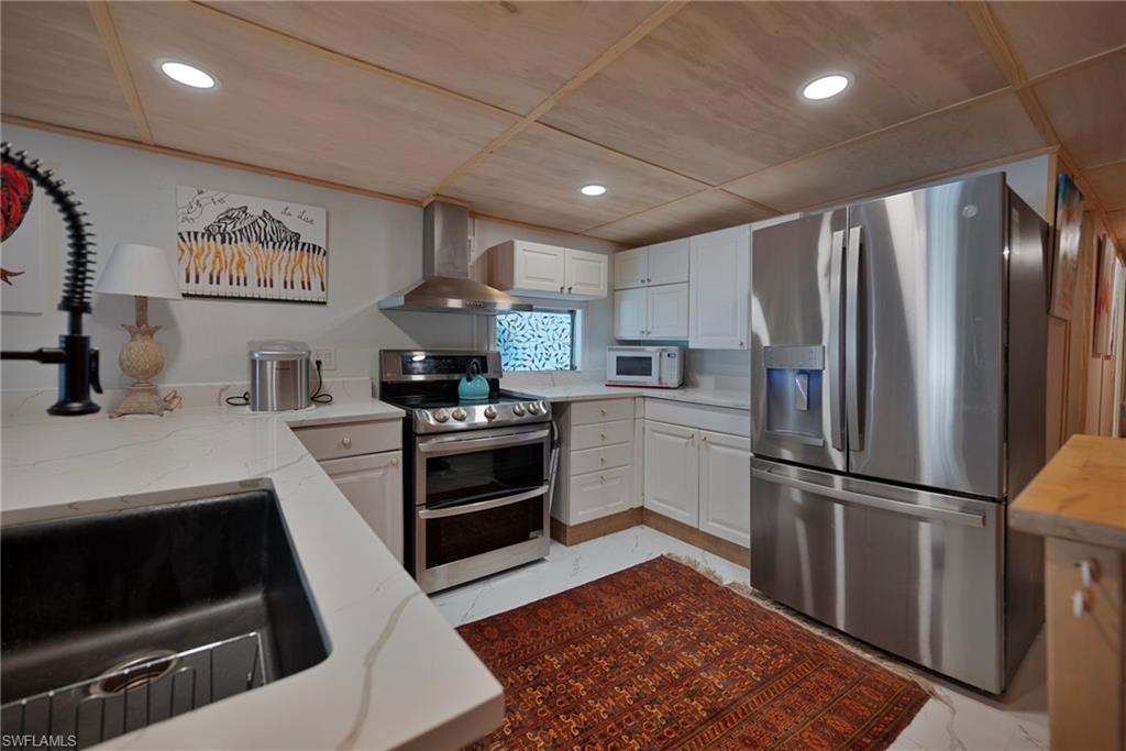 Kitchen with SS appliances
