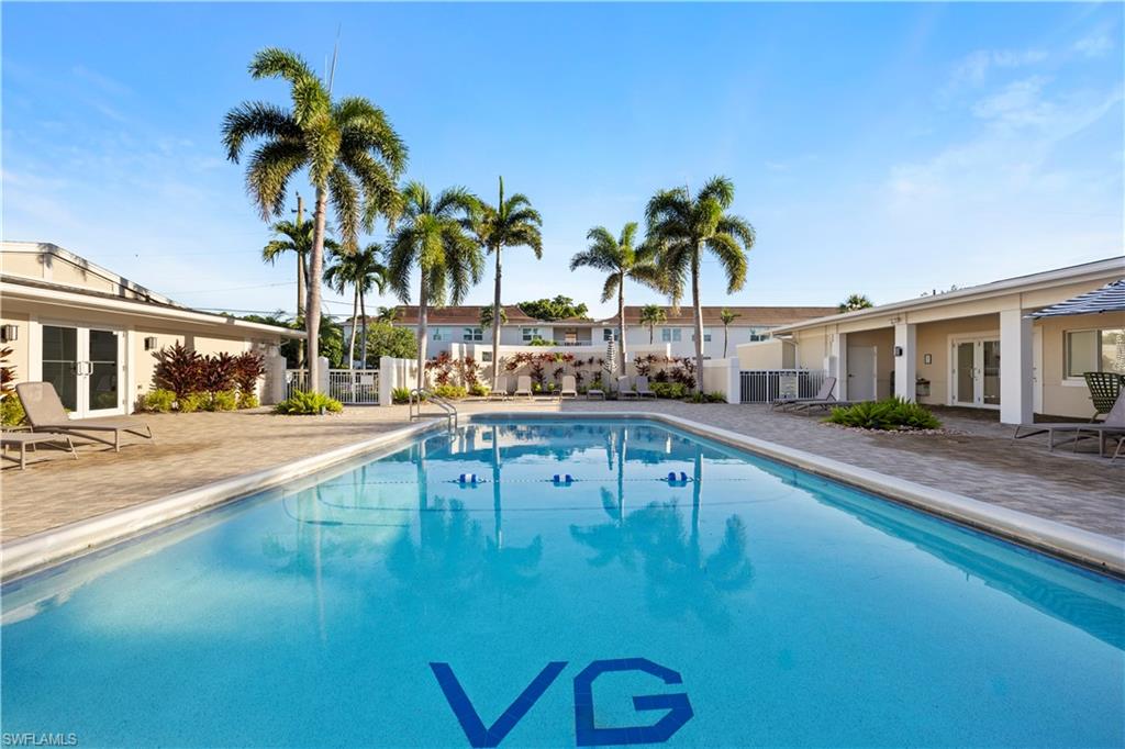 Community pool featuring a patio and french doors