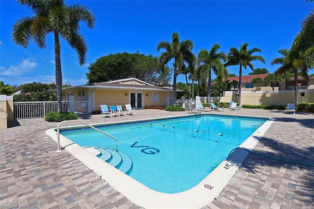 Community pool featuring a patio area