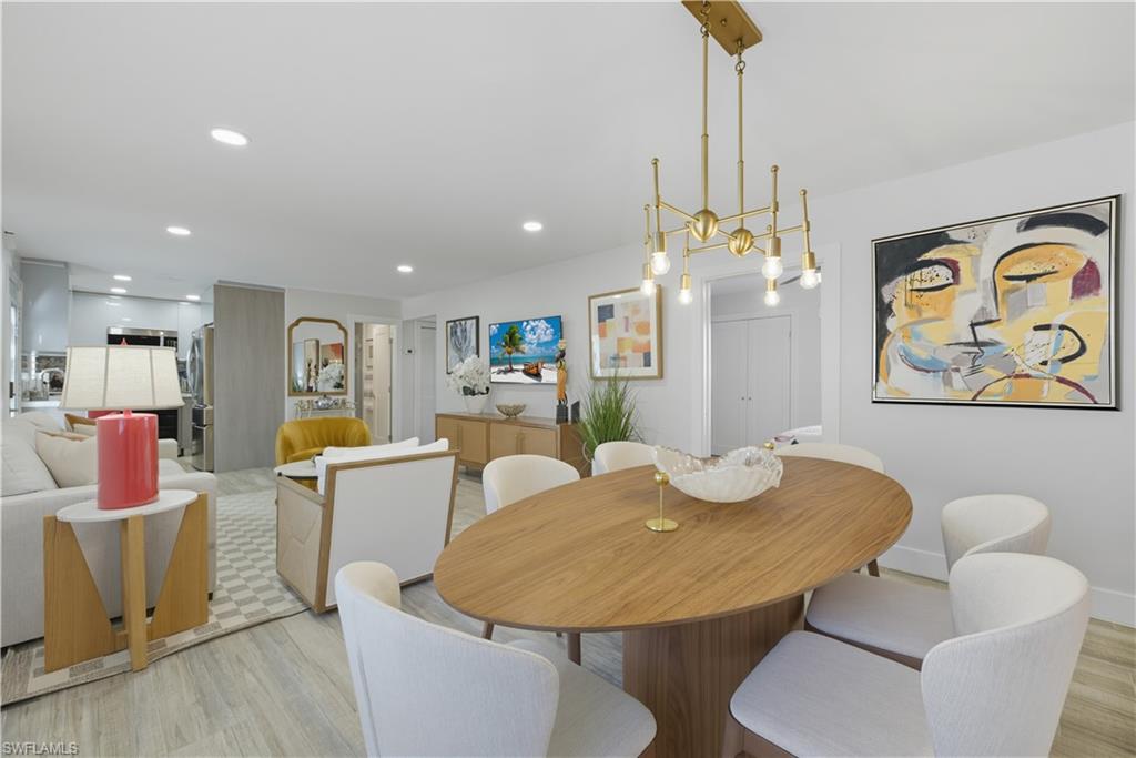 Dining room featuring recessed lighting and light wood-style floors