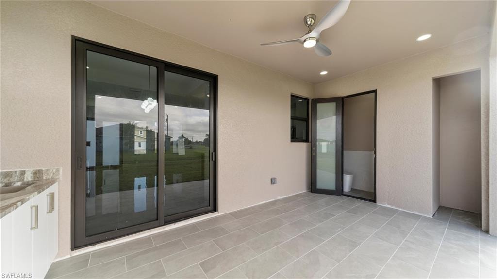 View of patio / terrace with ceiling fan
