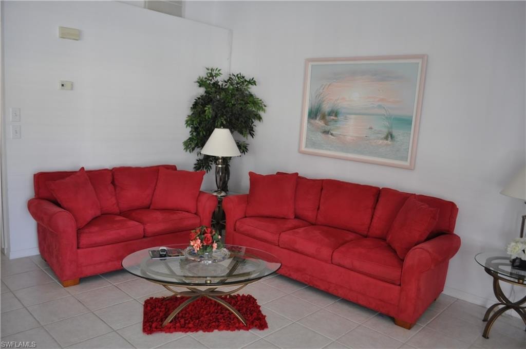 Tiled living area with baseboards