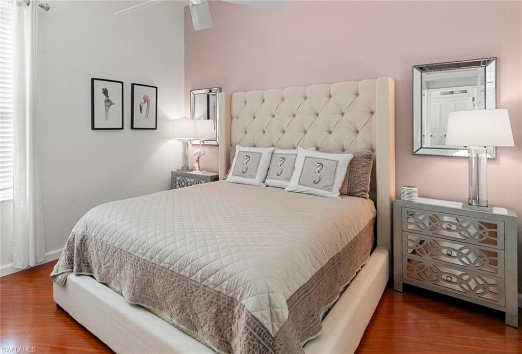 Bedroom featuring hardwood / wood-style flooring and ceiling fan