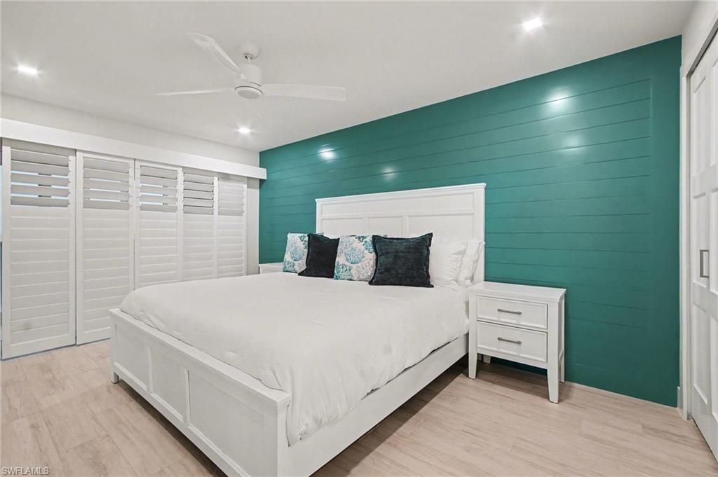Bedroom featuring light wood-finish flooring and recessed lighting