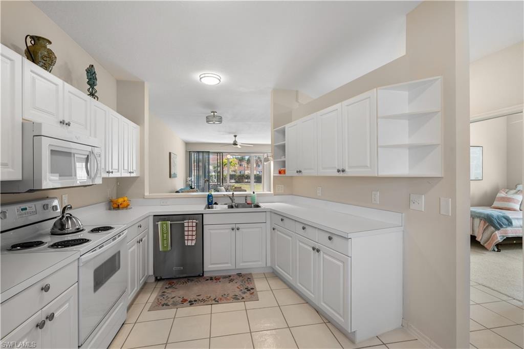 White cabinetry, and open shelves