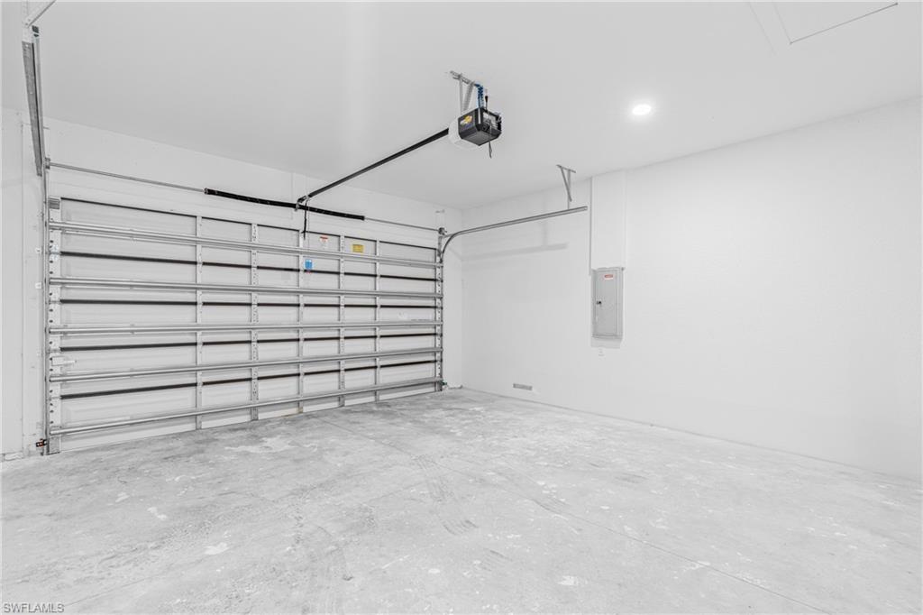 Laundry room featuring washer hookup and cabinet space