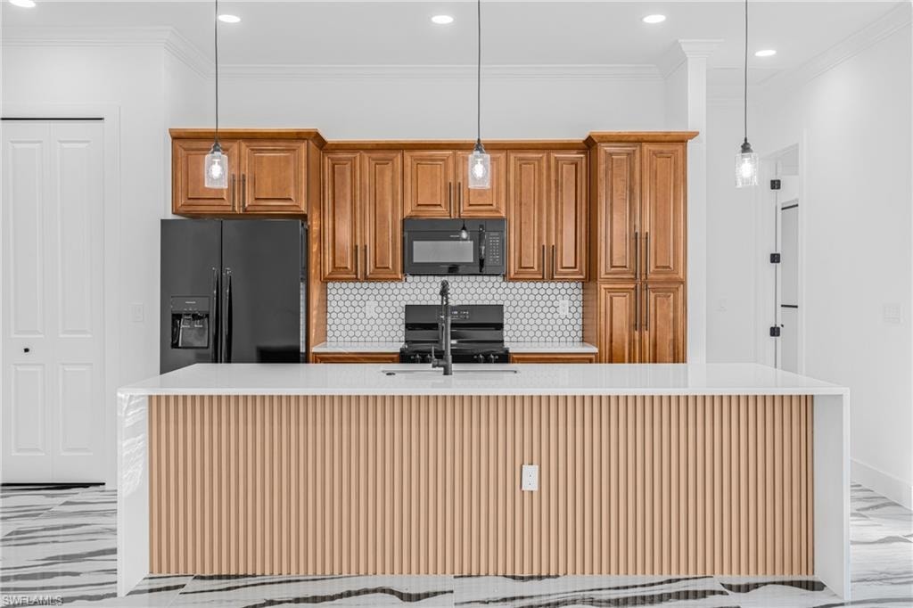 Kitchen with light marble finish floors, brown cabinets, light stone countertops, recessed lighting, and decorative backsplash