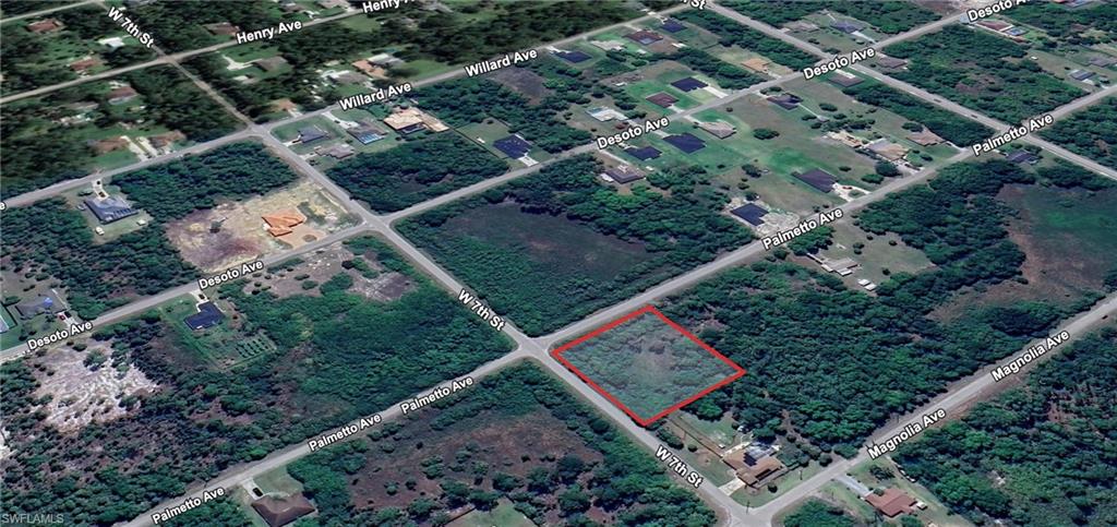 Aerial view of property's location featuring property parcel outlined