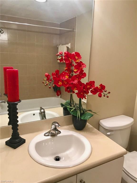Full bathroom featuring double vanity