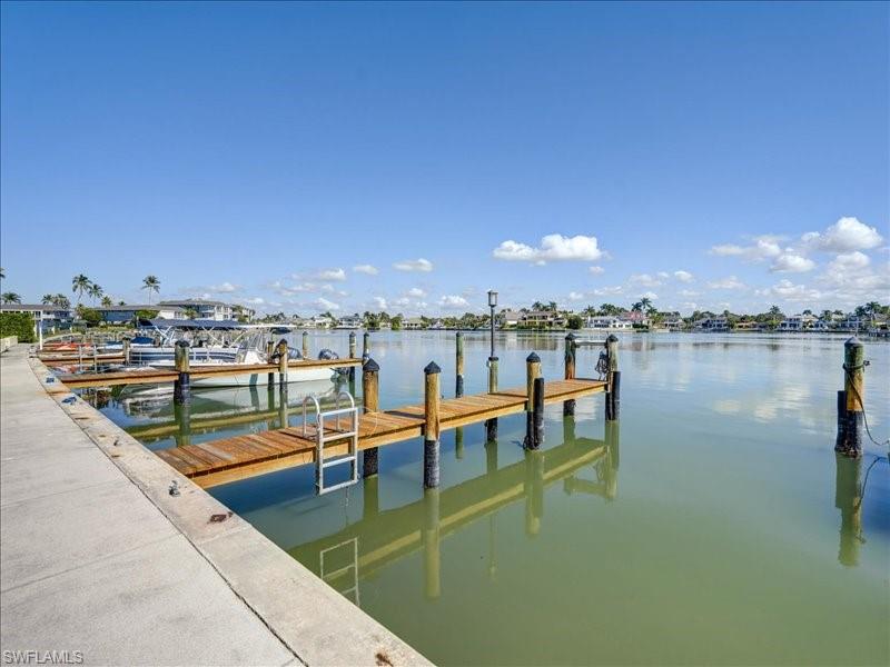 Dock featuring a water view