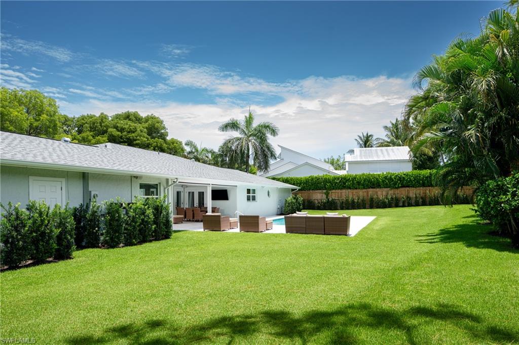 View of yard with a patio area and outdoor lounge area