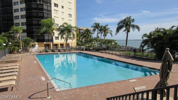 Community pool with a patio area