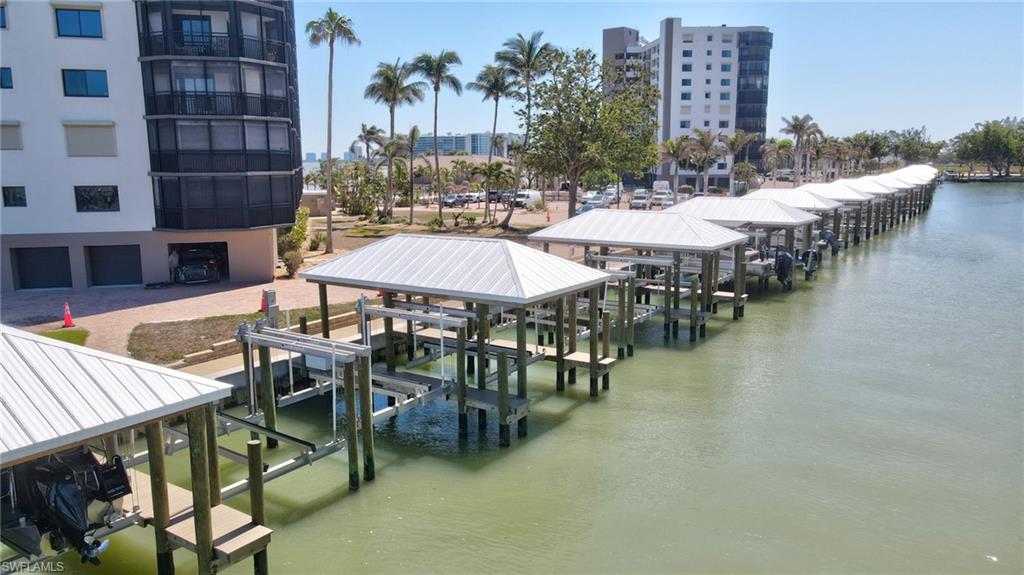 Dock with a water view and boat lift
