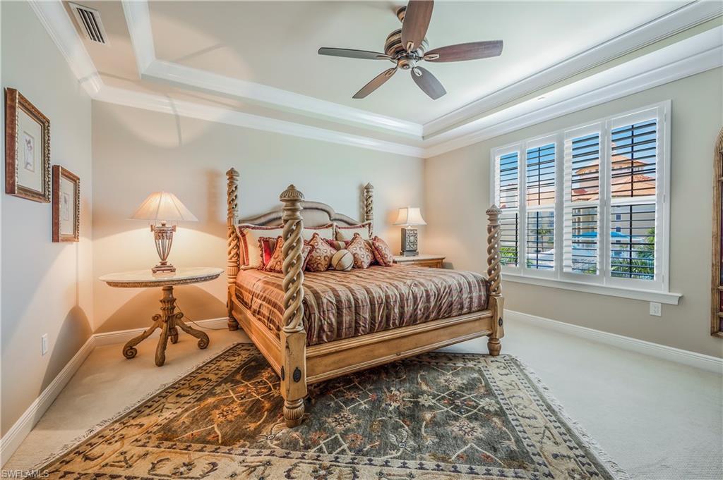 Guest suite #1 with split Plantation shutters