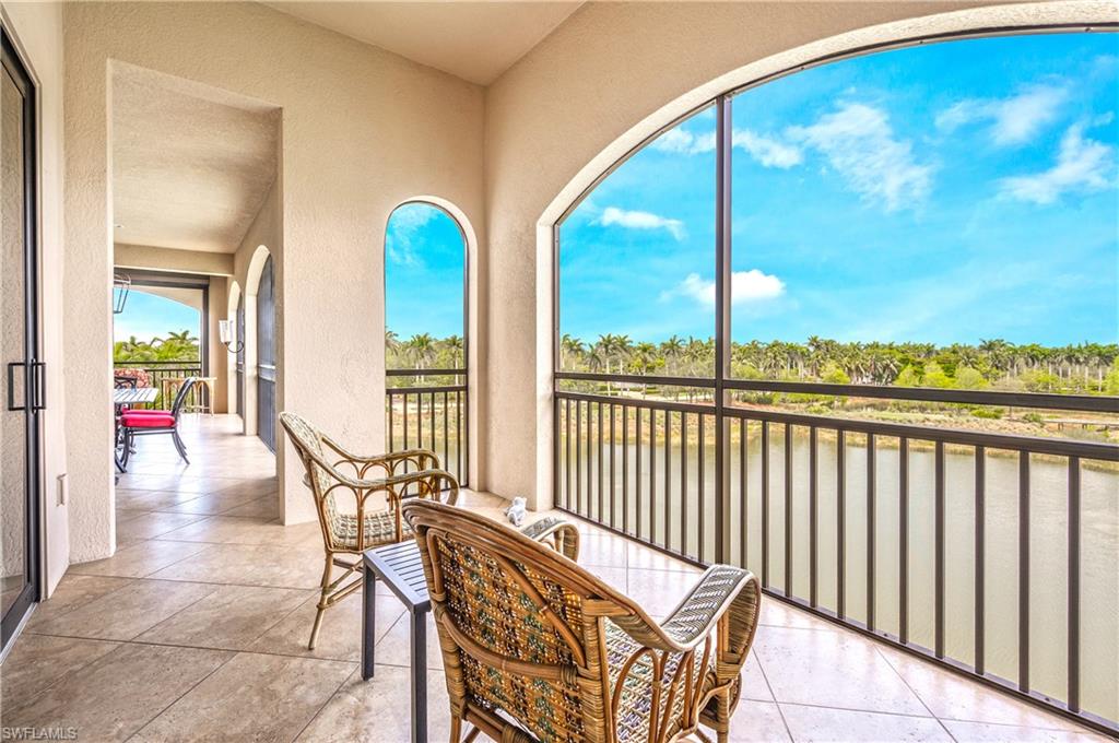Master bedroom sitting area water, golf & Palm views.