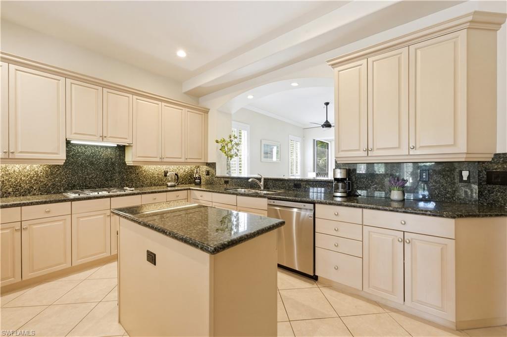 Gas cooking, stainless appliances & center island.