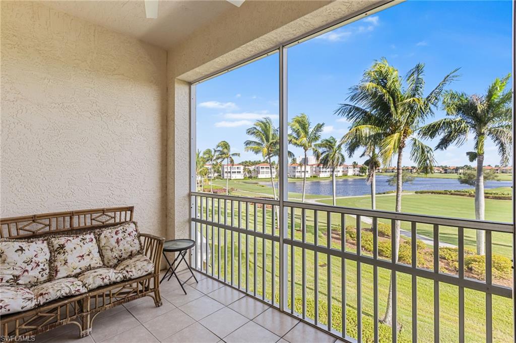 Balcony overlooks the golf course and lake.