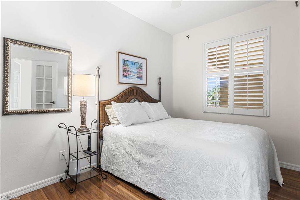 The den serves as a 3rd bedroom at this time. Plantation shutters. Laminate flooring.