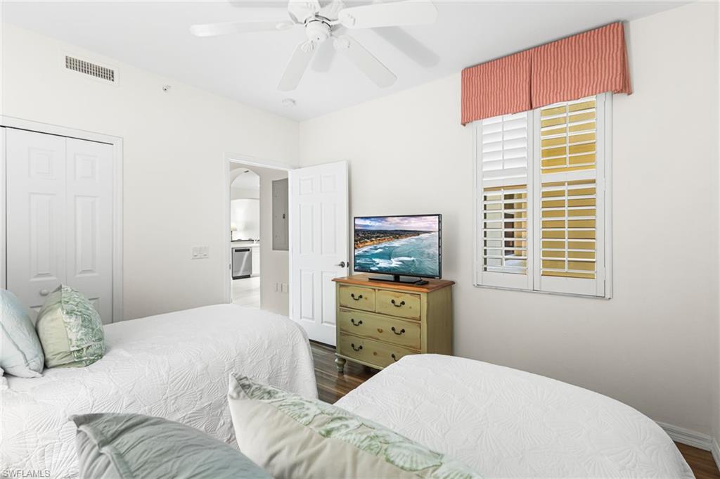 2nd bedroom offers twin beds. Plantation shutters.