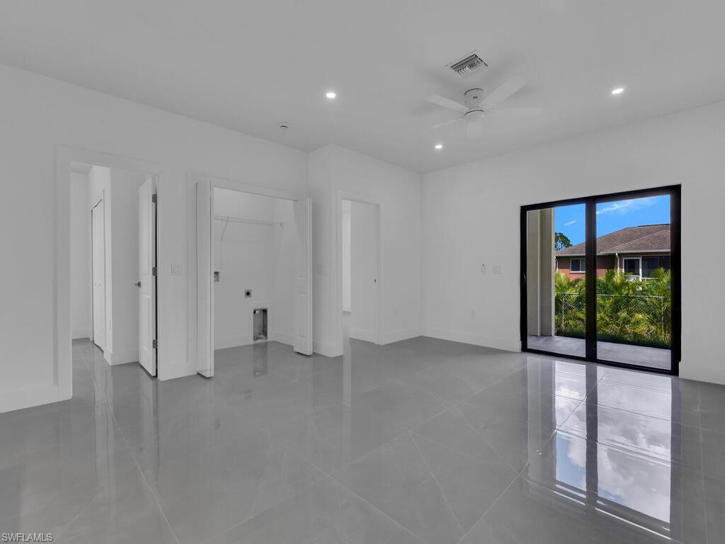 Spare room featuring recessed lighting, ceiling fan, and light tile patterned floors