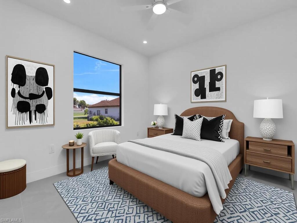 Bedroom with ceiling fan and recessed lighting