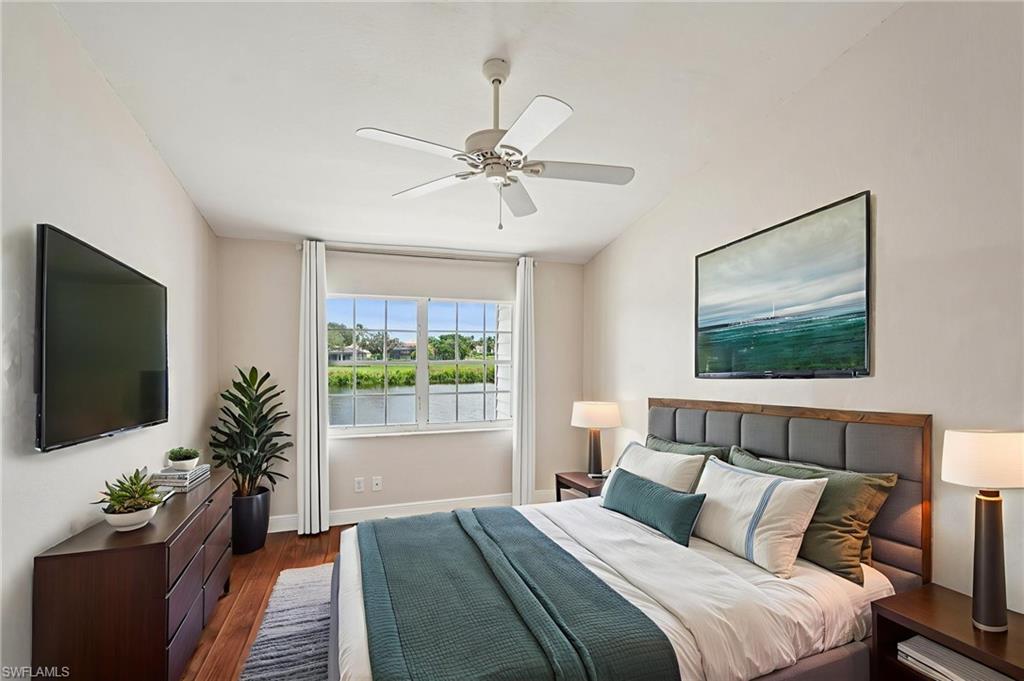 Bedroom featuring wood finished floors and a ceiling fan