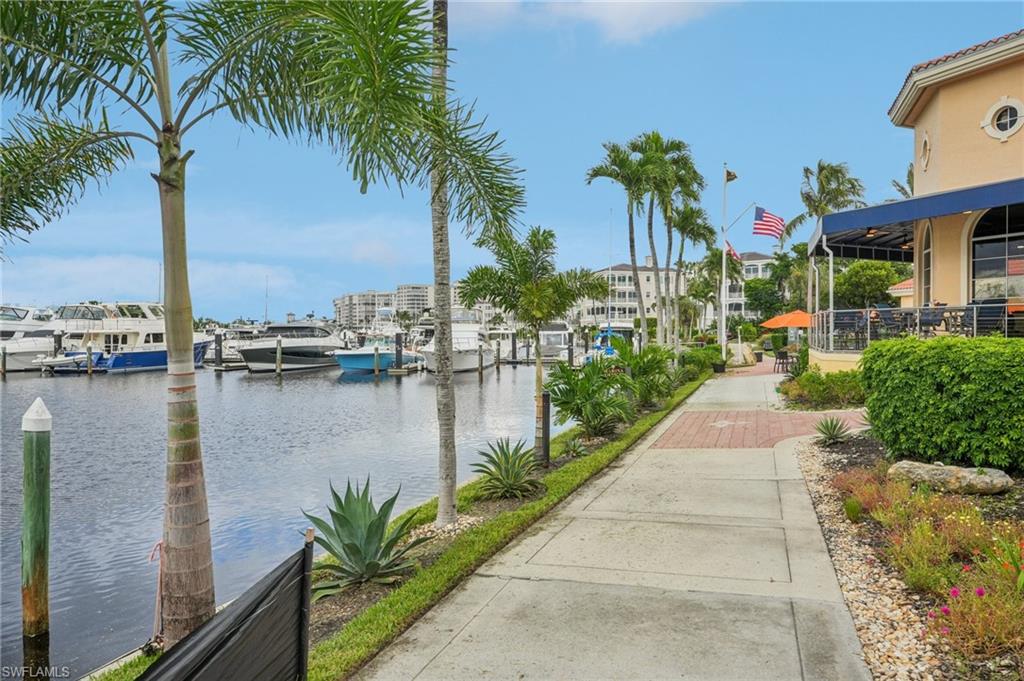Water view featuring a dock