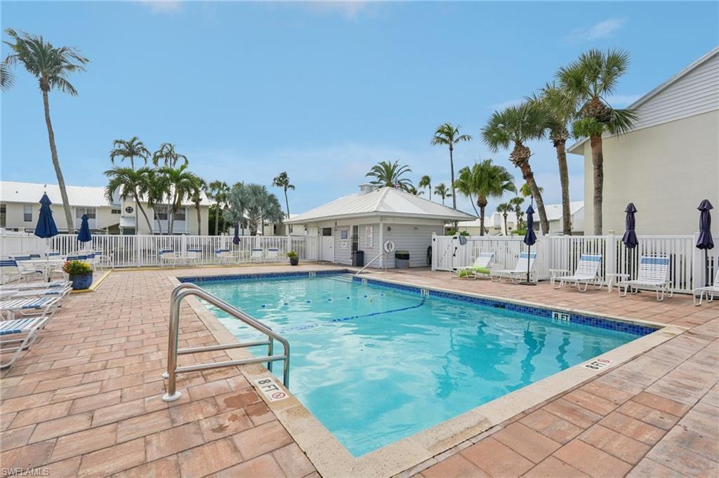 Community pool featuring a patio area