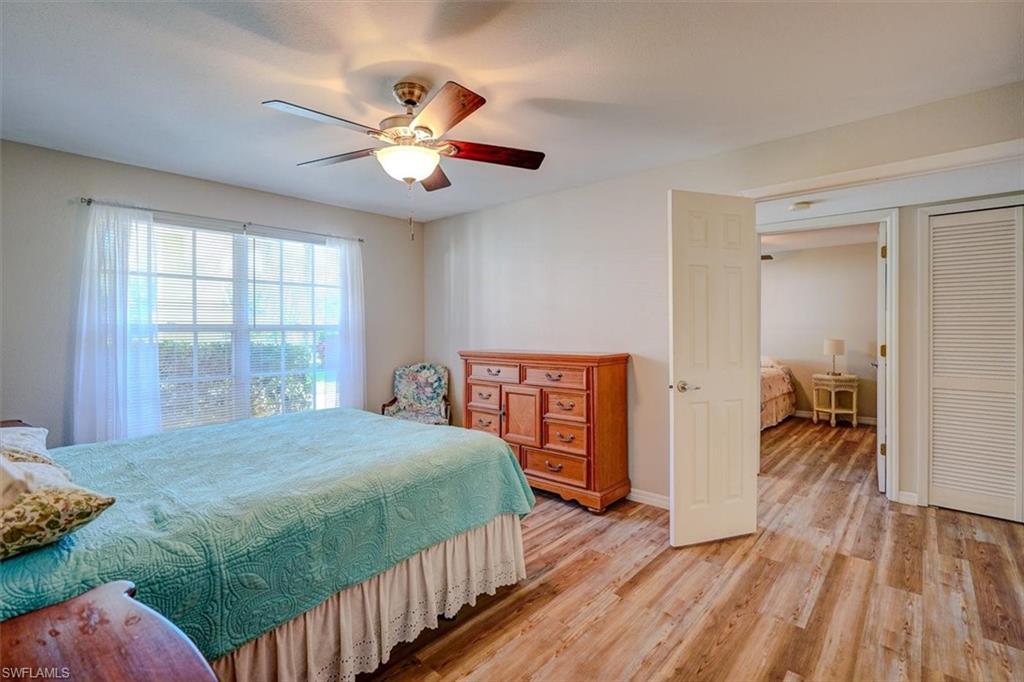Bedroom featuring light wood-style floors and ceiling fan