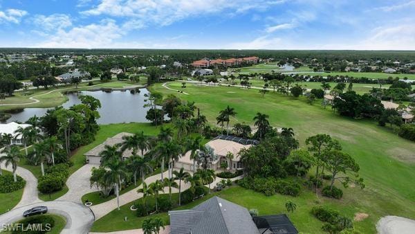 Drone / aerial view of a local golf course and a nearby body of water