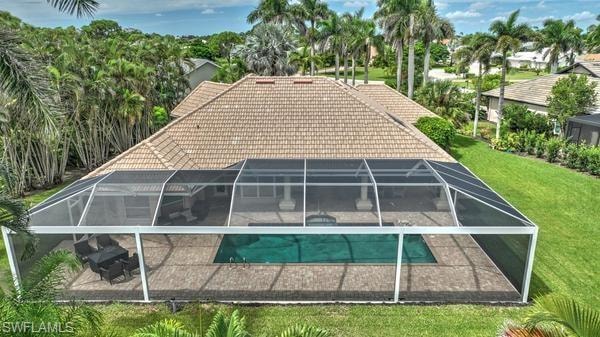 Exterior view of a pool and a tiled roof