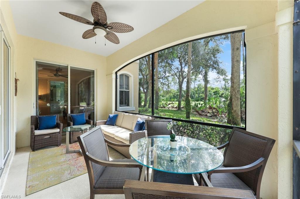 Sunroom featuring ceiling fan