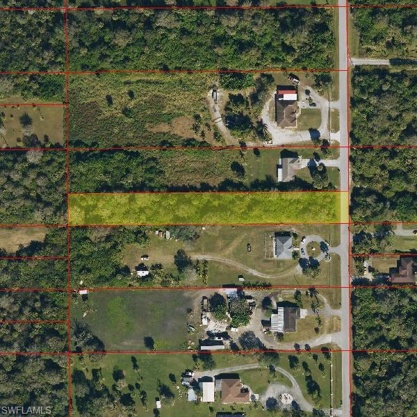 Aerial view of property's location featuring property parcel outlined