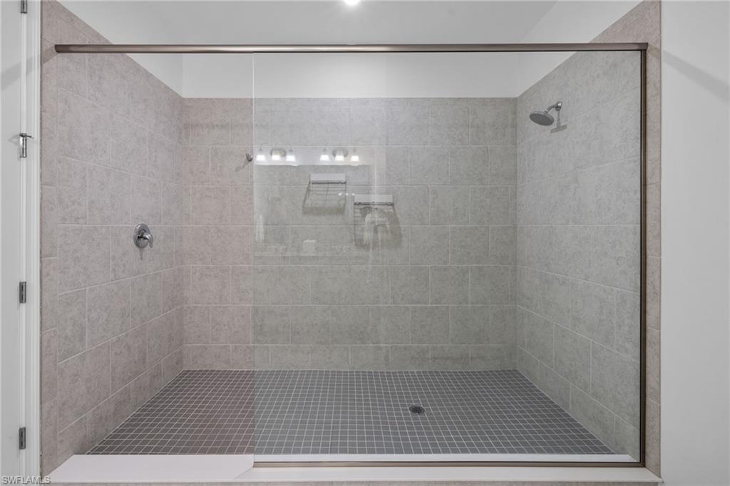 Full bathroom with a stall shower