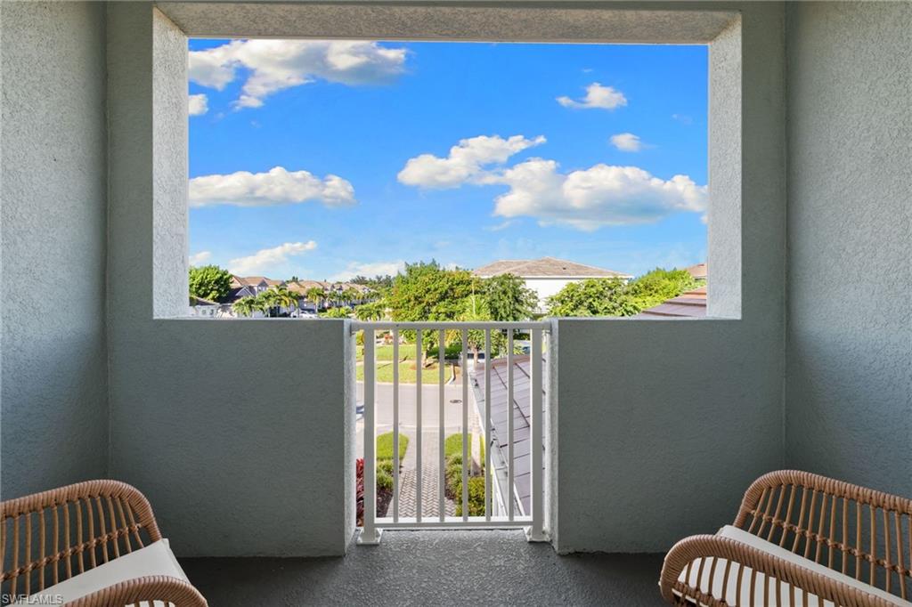 Balcony featuring a residential view