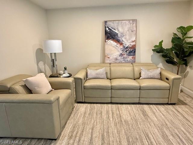 New leather couches and art