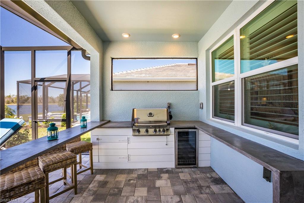 Outdoor cooking/bar area under covered lanai