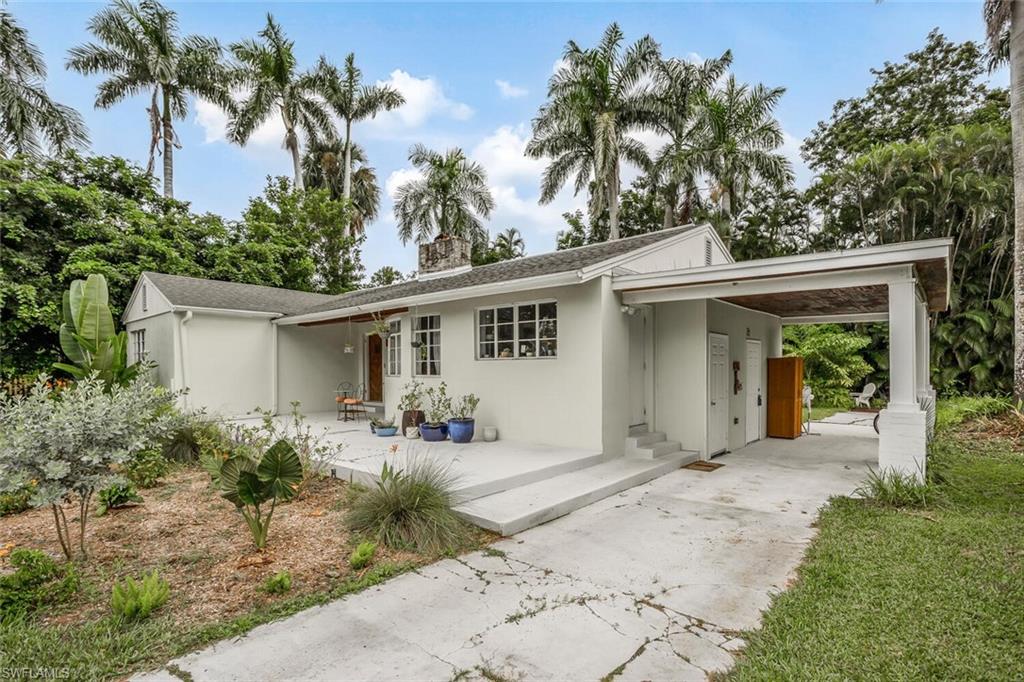 Carport with extended driveway!