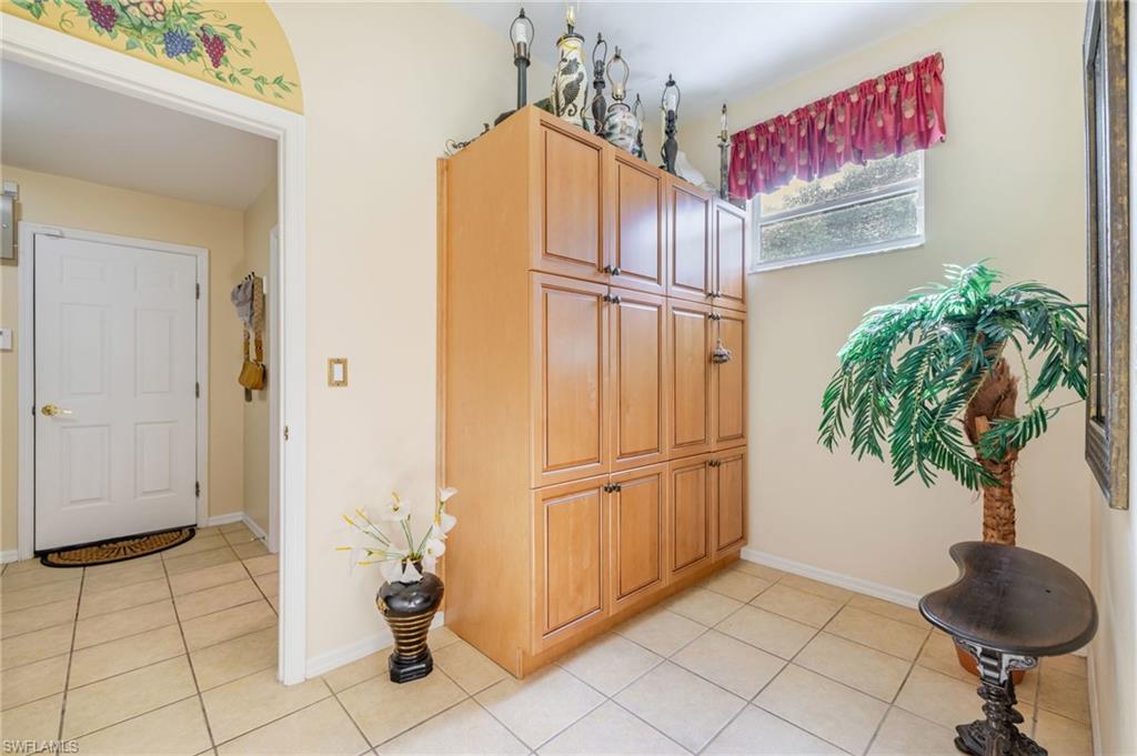 Kitchen featuring light tile patterned floors