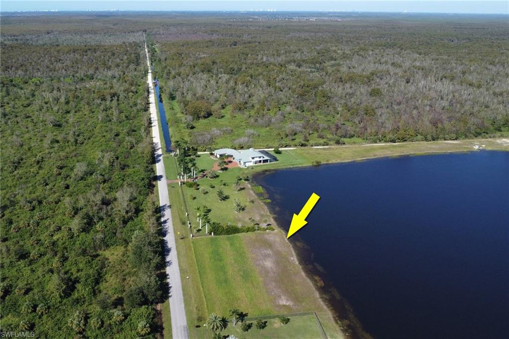 View of property location featuring a heavily wooded area