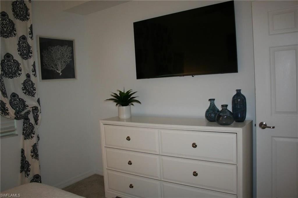 Bedroom featuring baseboards