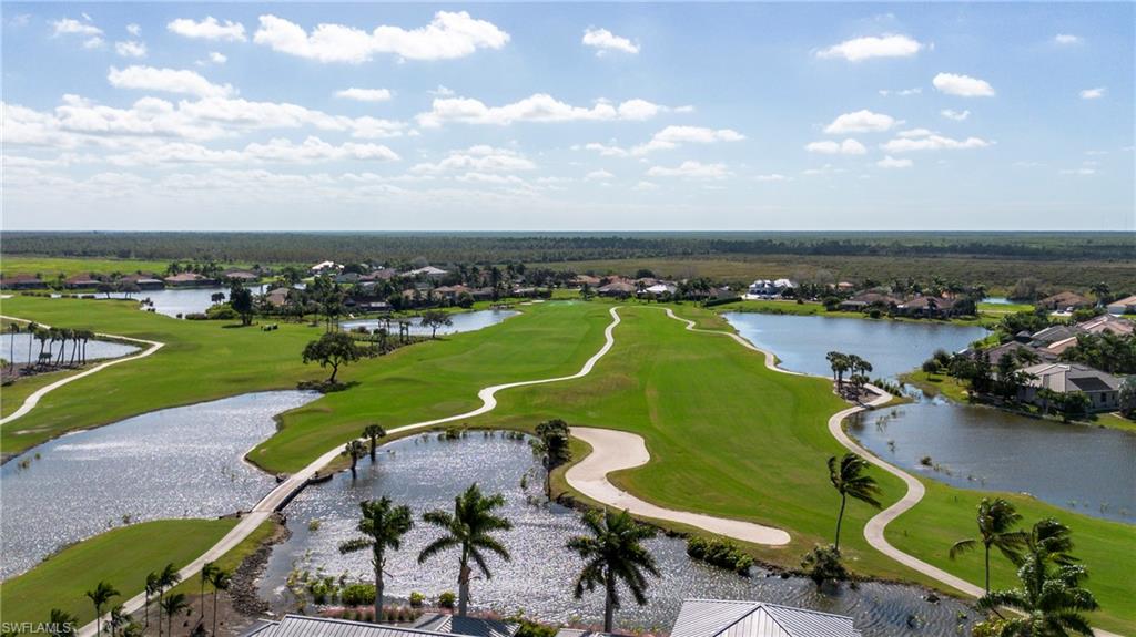 Aerial view of residential area with a golf course