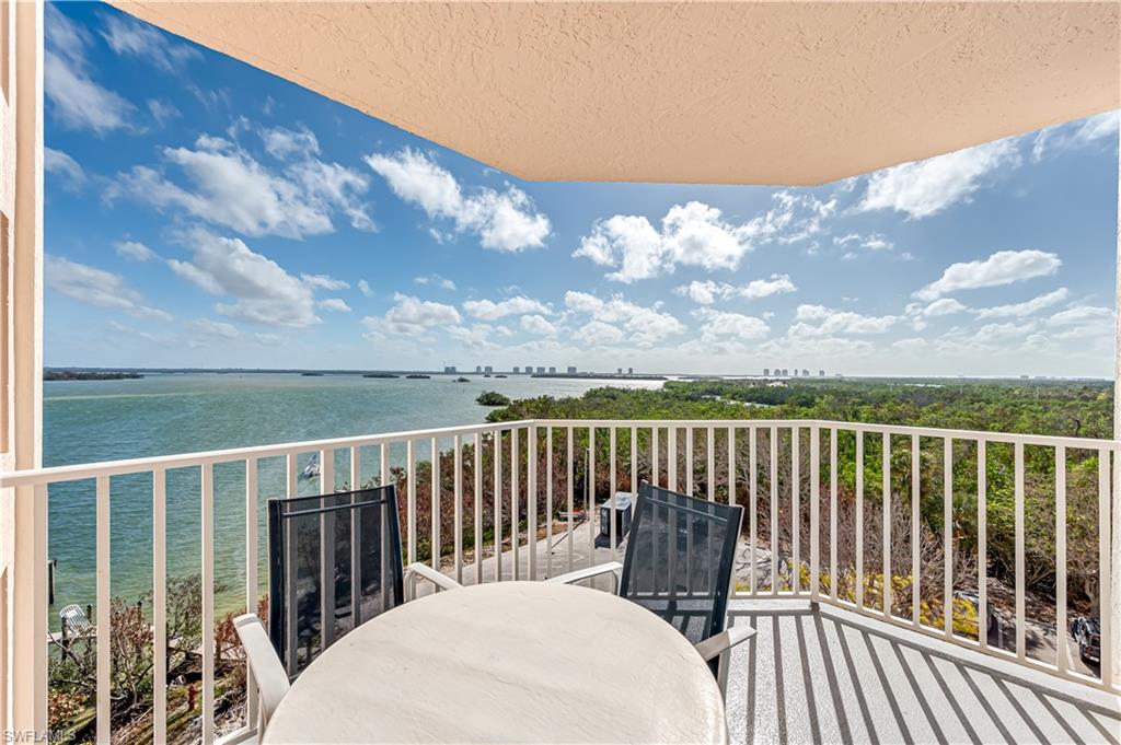 Balcony featuring a water view Virtually edited image