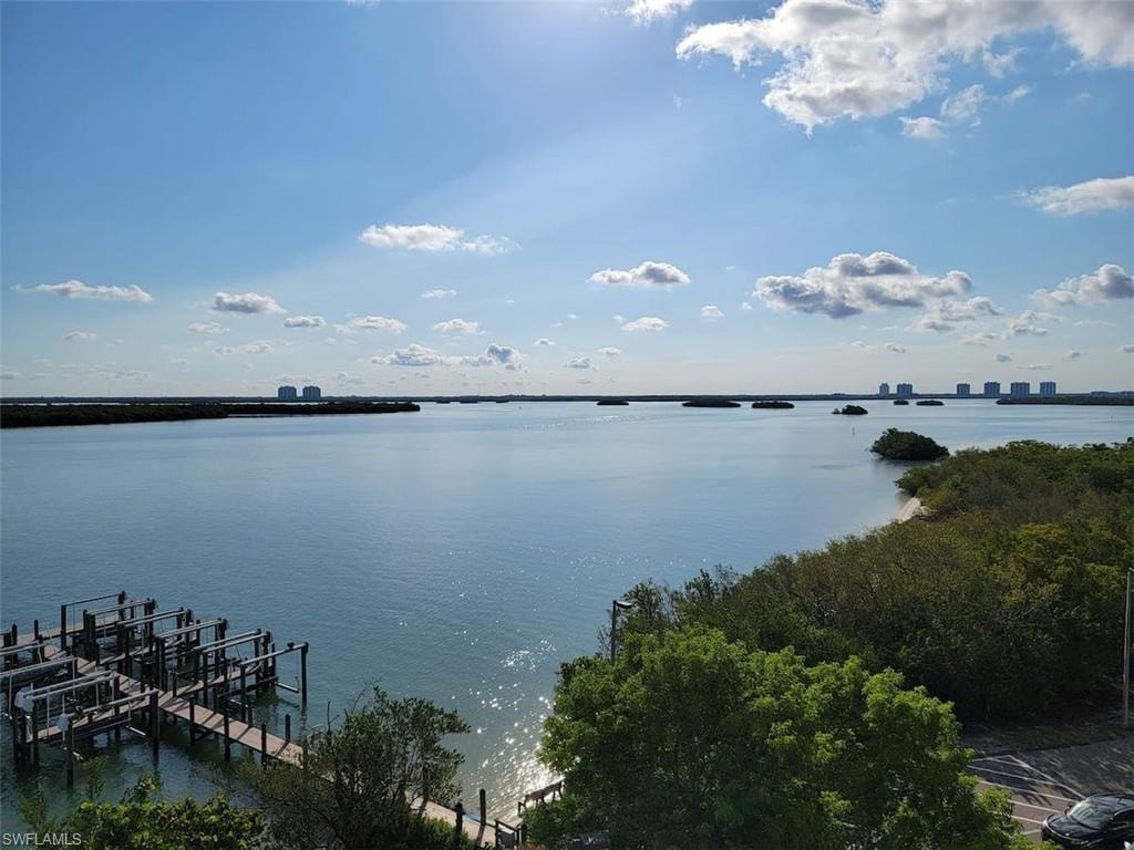 View of water feature with a boat dock Virtually edited image