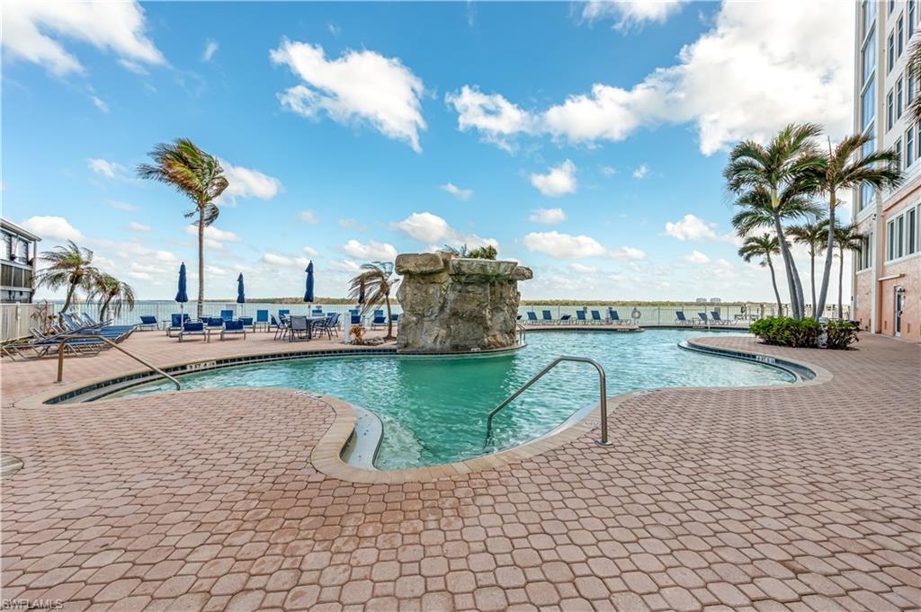 View of pool featuring a patio area Virtually edited image