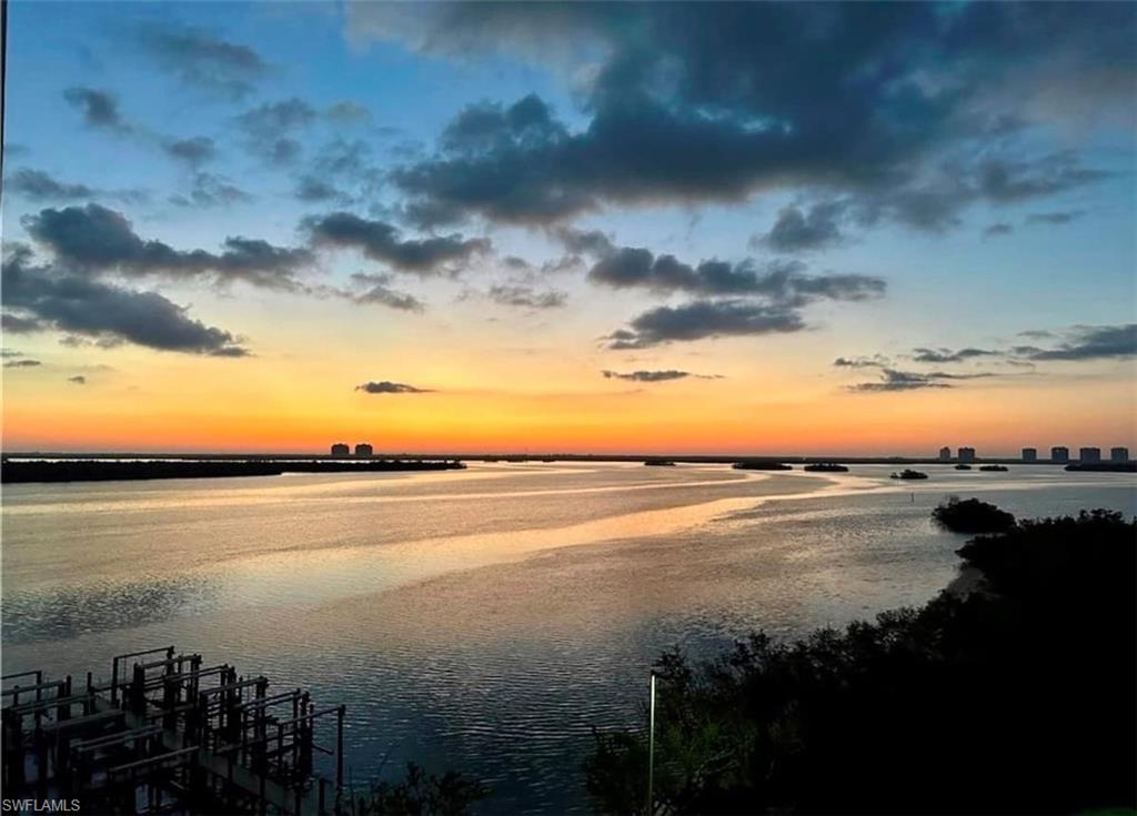 View of water feature featuring a boat dock Virtually edited image