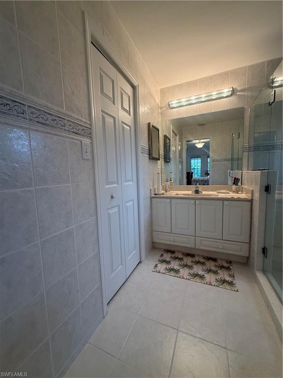 Living area with light tile patterned flooring and recessed lighting