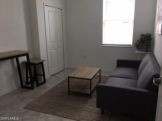 View of tiled living room